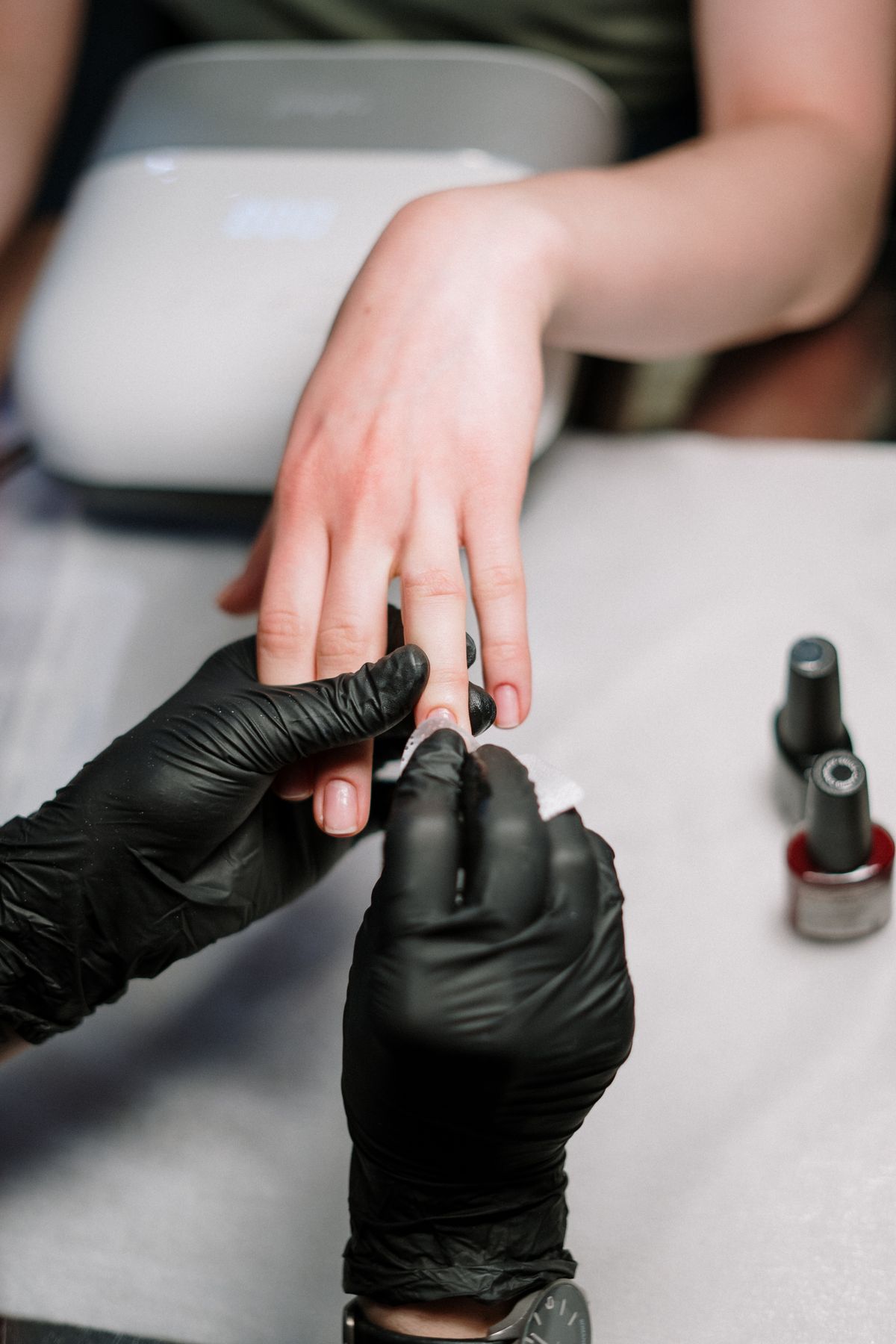 Manicure in progress at Nailed By EM (placeholder image)